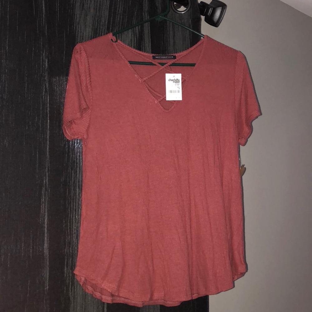 a wine color shirt, new with tags